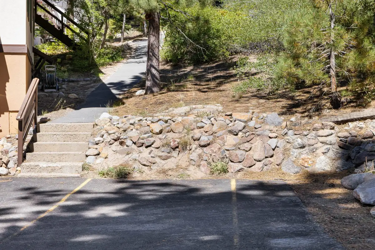 Parking area with stone steps leading up to the home, Cortina Chalet