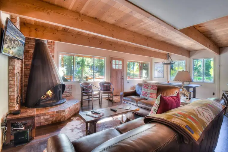 Stay cozy and gather around with some hot chocolate by the wood fireplace!