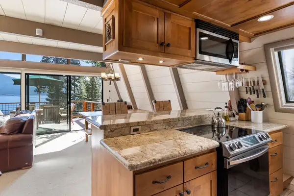 A-frame kitchen with granite counters and lake view windows, Livin' on the Edge