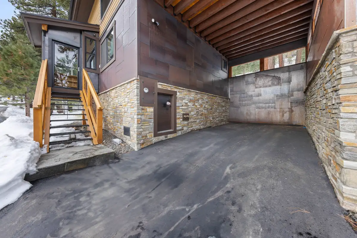 Covered parking area with stairs to the entry, Sugar Pine Tahoe Lodge
