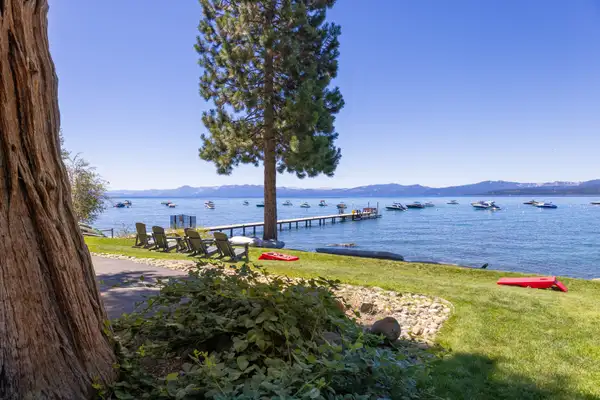 Lawn leading to Lake Tahoe with a pier, Lakeside Luxe Retreat