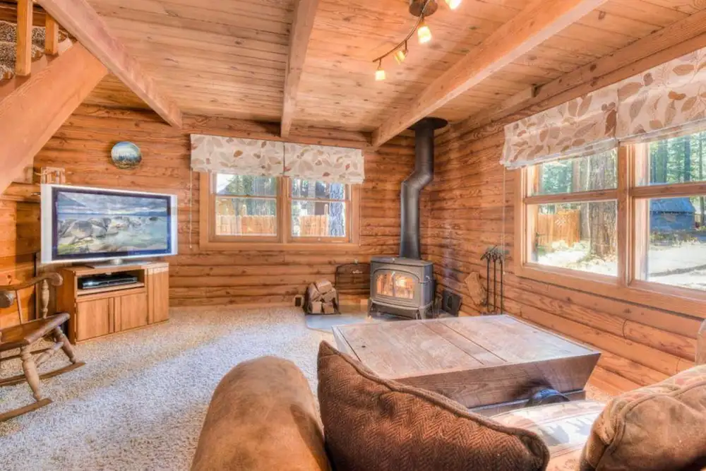 Wooden interior and fireplace warms your heart and make you cozy all time!, Enchanted Woods Cabin, an MG home in Homewood