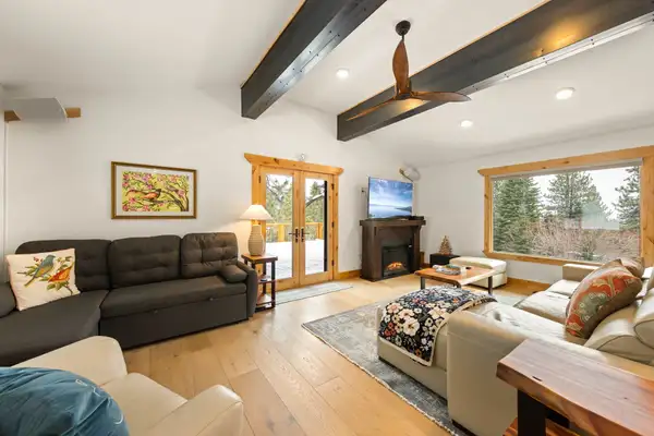Living room with sectionals and French doors, Sugar Pine Tahoe Lodge