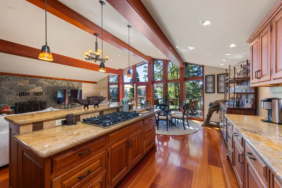 Kitchen island with cooktop and dining nook beyond, Incline Lakeside Haven