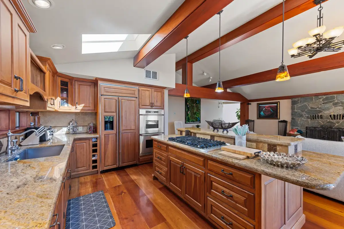 Kitchen with wood cabinets, granite counters and island, Incline Lakeside Haven