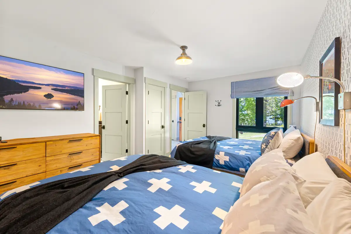 Bedroom with two beds and blue bedding, Lakeside Luxe Retreat