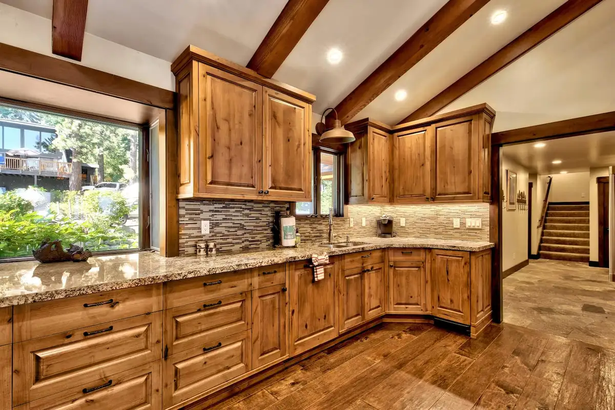 Kitchen with wood cabinets and granite counters, Mammoth Haven Retreat