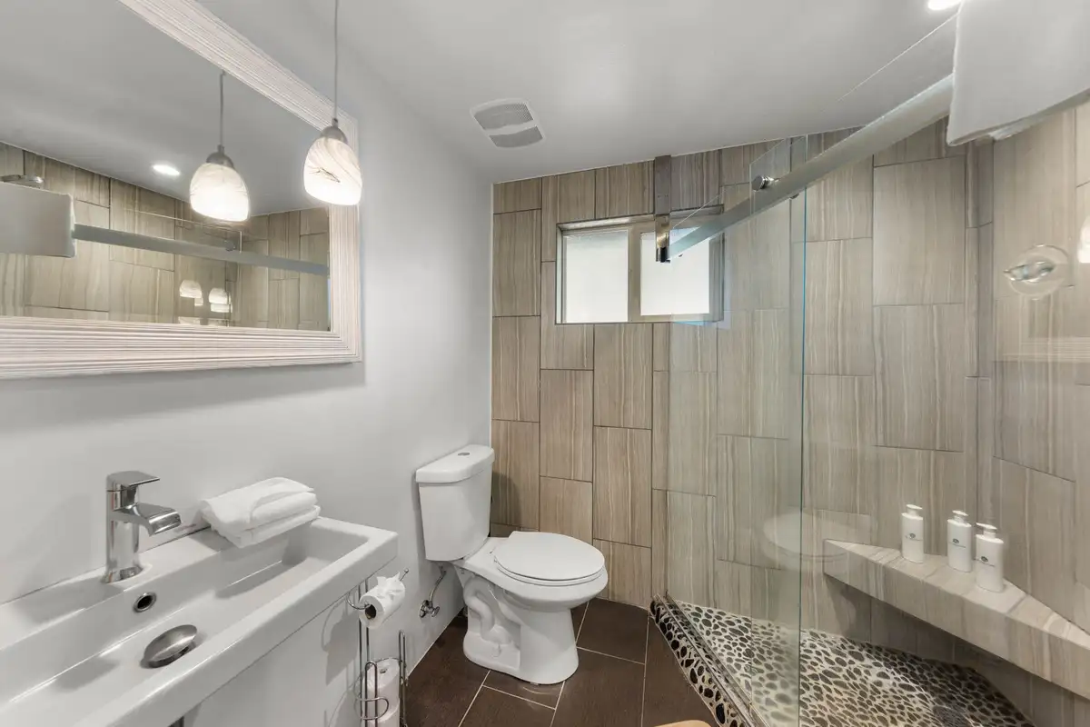 Bathroom with a glass walk-in shower and floating sink, Tahoe Lake & Mountain Retreat