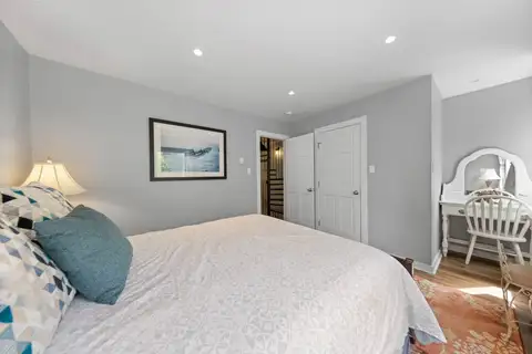 Bedroom with a bed and vanity desk, Tahoe Peaks & Shores Retreat