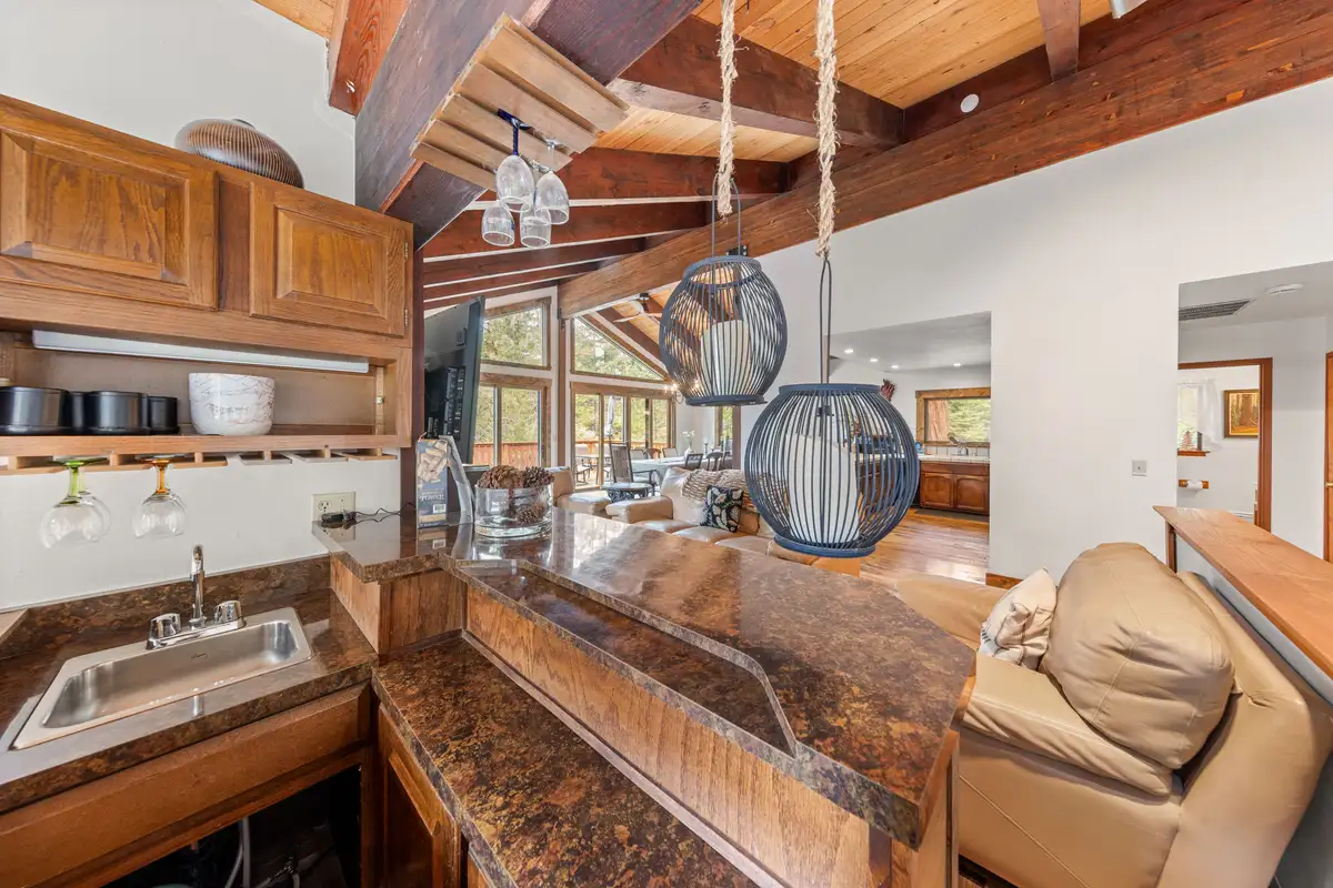 Wet bar with sink and hanging egg chairs, Evergreen Hideout
