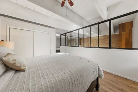Loft sleeping area with interior windows overlooking the living room, Treetop on Country Club
