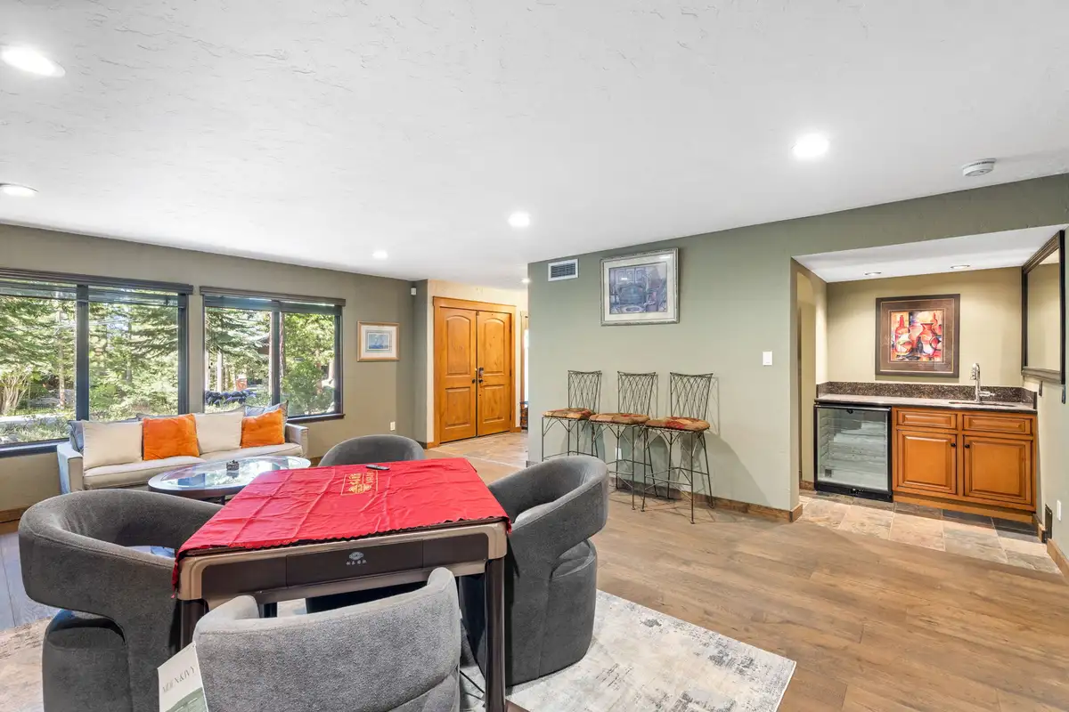 Game room with a card table, wet bar and seating, Tranquil Stay