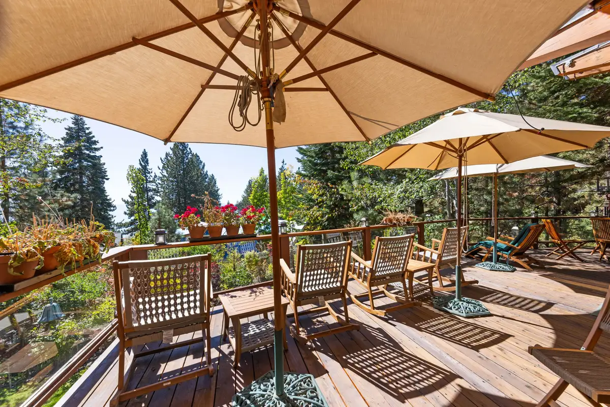 Deck with umbrellas, rocking chairs and flower boxes, Incline Lakeside Haven