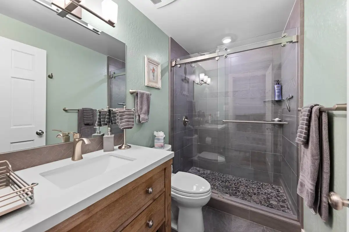 Bathroom with a glass shower and double vanity, Tahoe Peaks & Shores Retreat