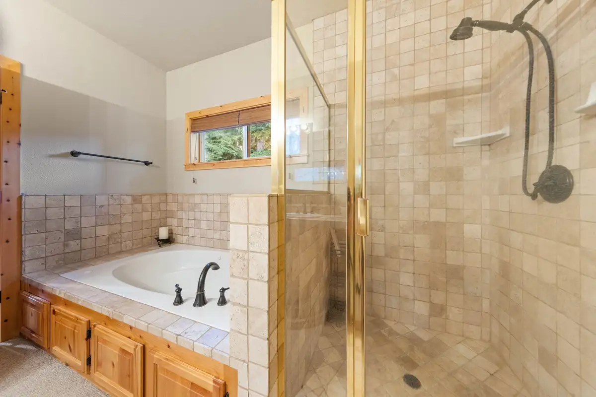 Bathroom with soaking tub and glass shower, Lakeview Grandeur