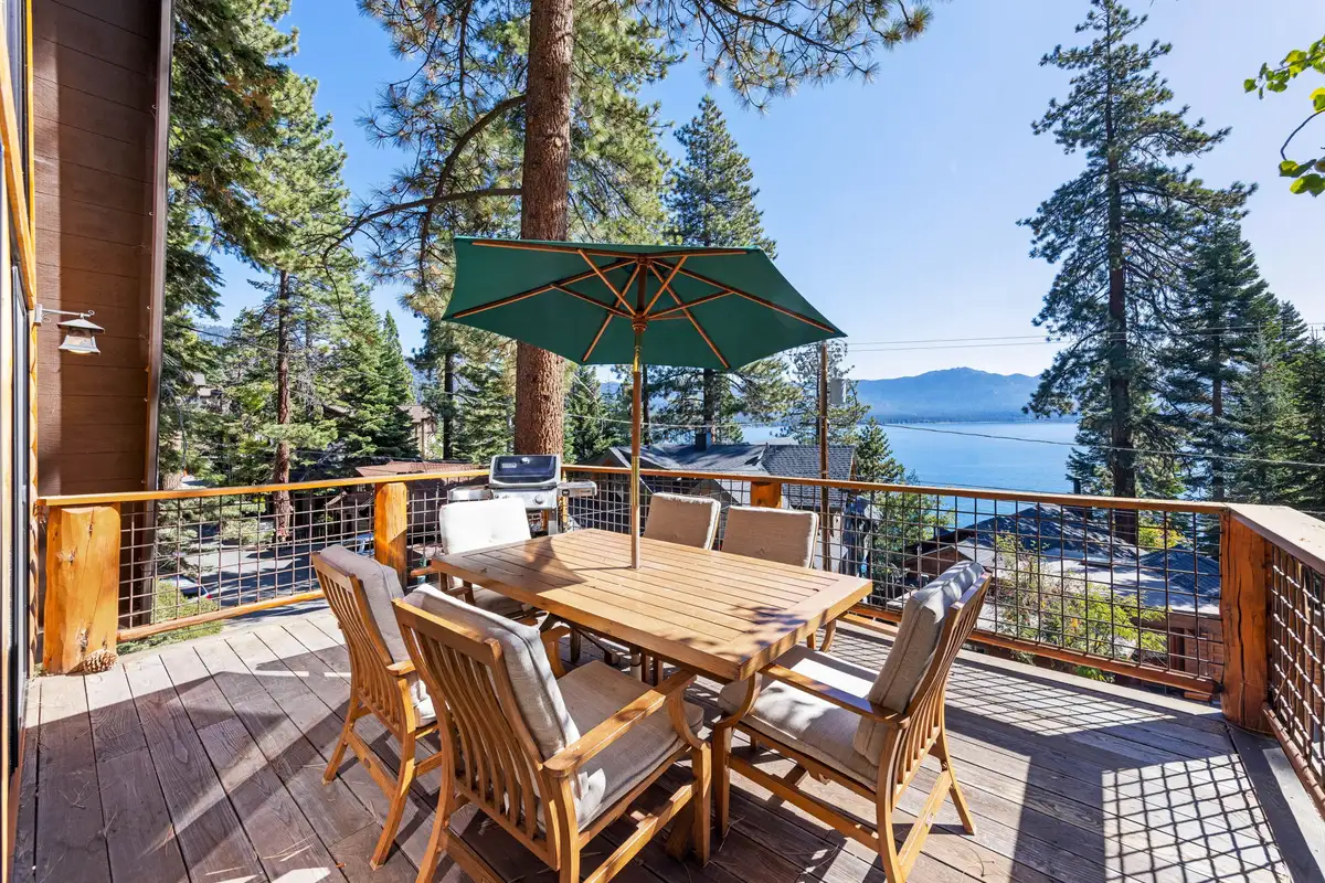 Deck with umbrella dining set and Lake Tahoe view, Livin' on the Edge