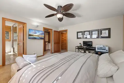 Bedroom with a bed, desk and ceiling fan, Elevated Tahoe Escape