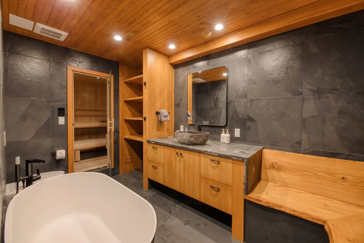 Bathroom with freestanding tub, stone vessel sink and sauna door, Lunar Lakeview Haven