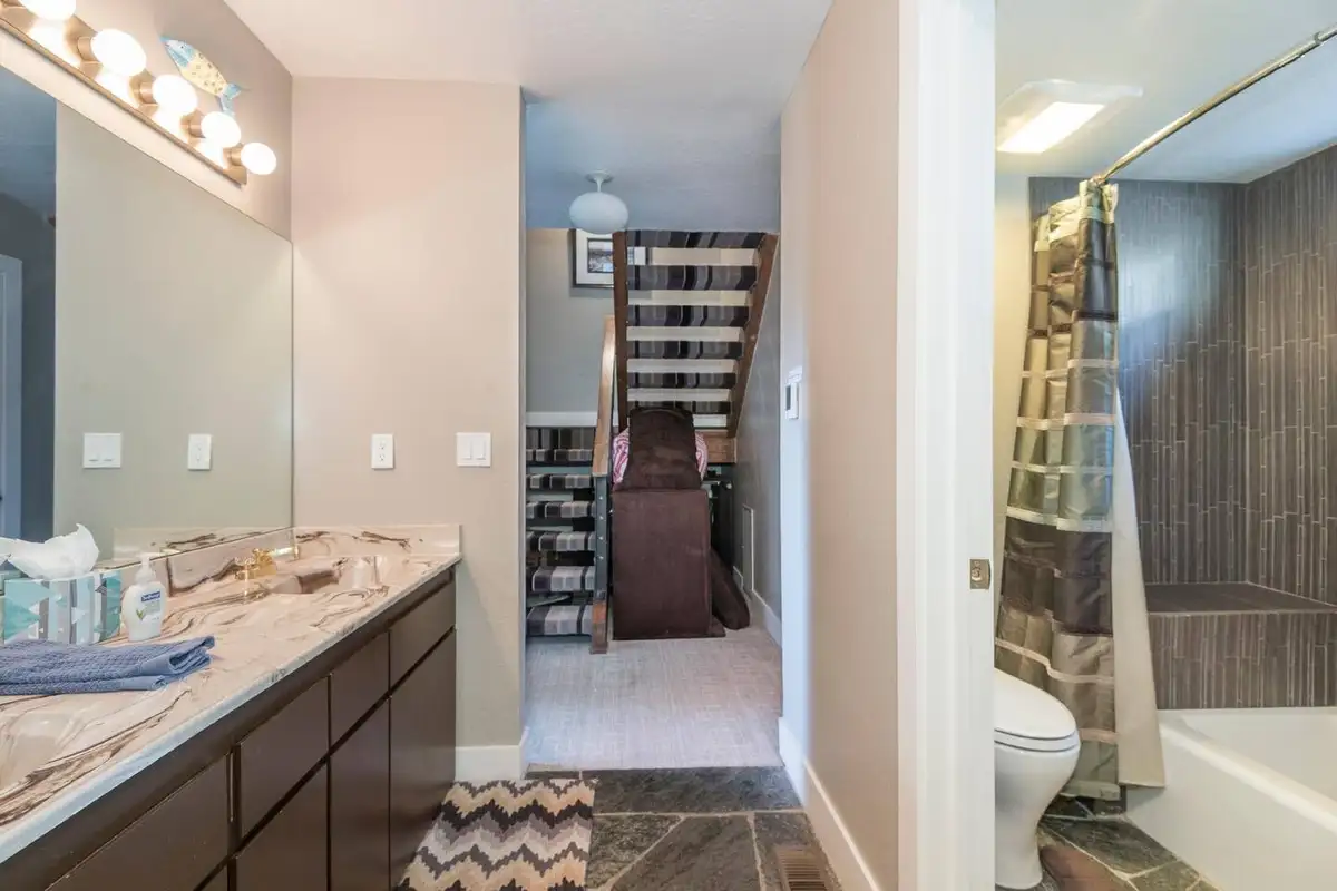 Bathroom with a long vanity and tiled shower, Skylake Serenity Retreat