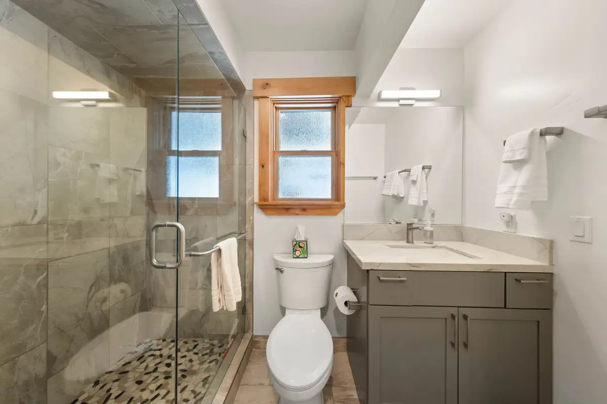 Bathroom with a glass shower and gray vanity, Sugar Pine Tahoe Lodge