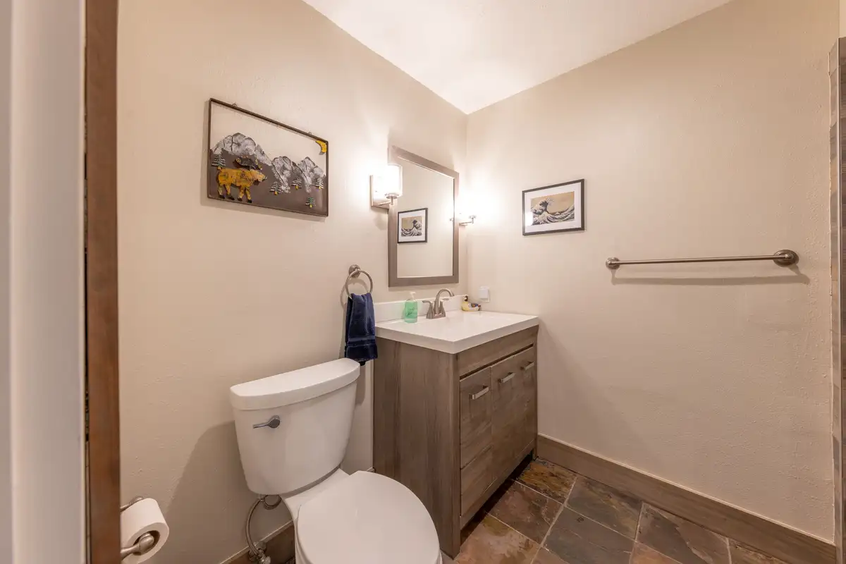 Bathroom with a vanity, toilet and slate tile floor, Tranquil Stay