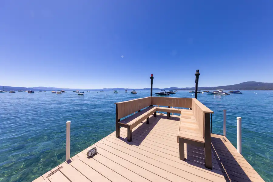 End of a pier with benches on Lake Tahoe, Lakeside Luxe Retreat