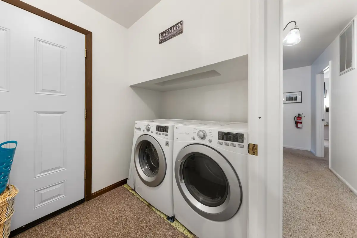 Laundry nook with front-load washer and dryer, Sierra Woodlands Getaway