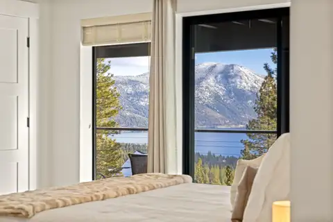 Bedroom with Lake Tahoe and mountains visible through the windows, Incline Lakehouse Lookout