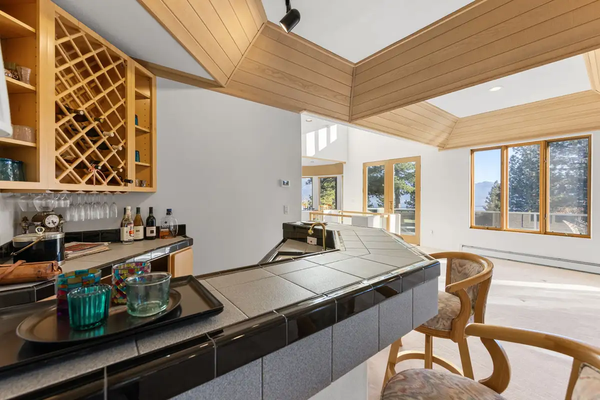 Wet bar with wine rack and tiled counter, 90s Tahoe Time Capsule